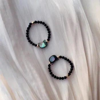 Népszerű a nem halványuló ultra-finom energia fekete macska gyöngy string gyűrű kristály kő, természetes fekete kristály női ékszerek kiegészítők